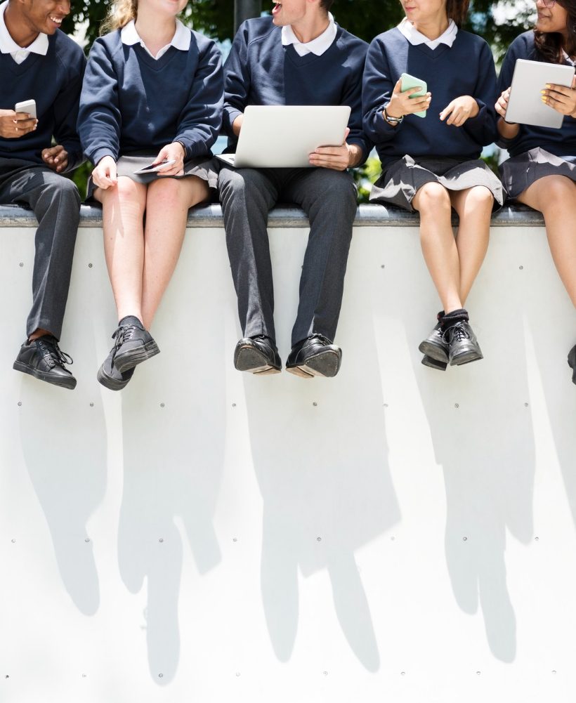 students-doing-homework-park